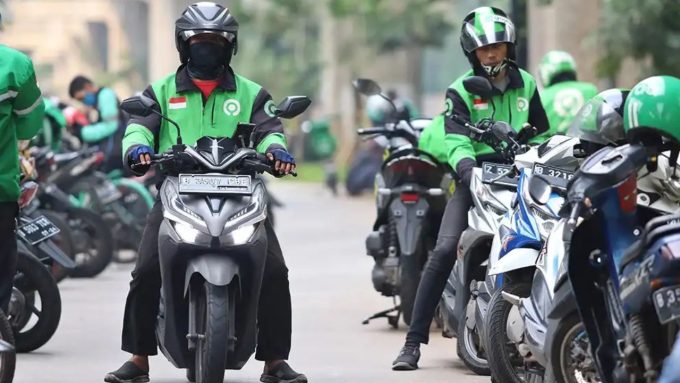 Ilustrasi pengemudi ojek online 'Gojek'.
